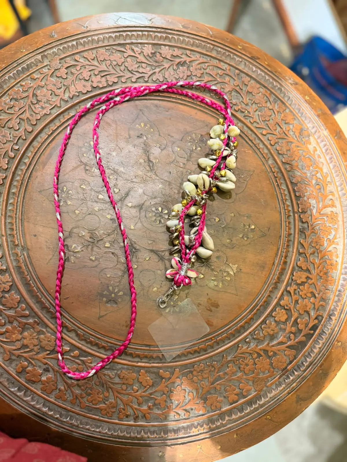 Pink traditional shell and bead mobile sling cord with metallic accents